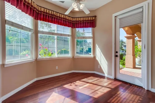 a view of empty room with a fireplace