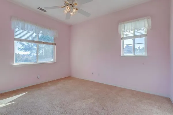 a bathroom with a bathtub sink and mirror