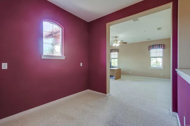 a patio with yard glass top table and chairs