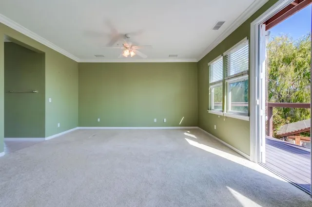 a view of a house with a tree s