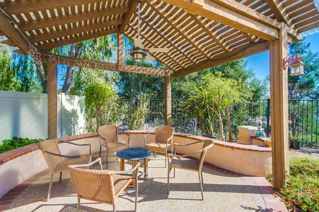 a view of a park with large trees