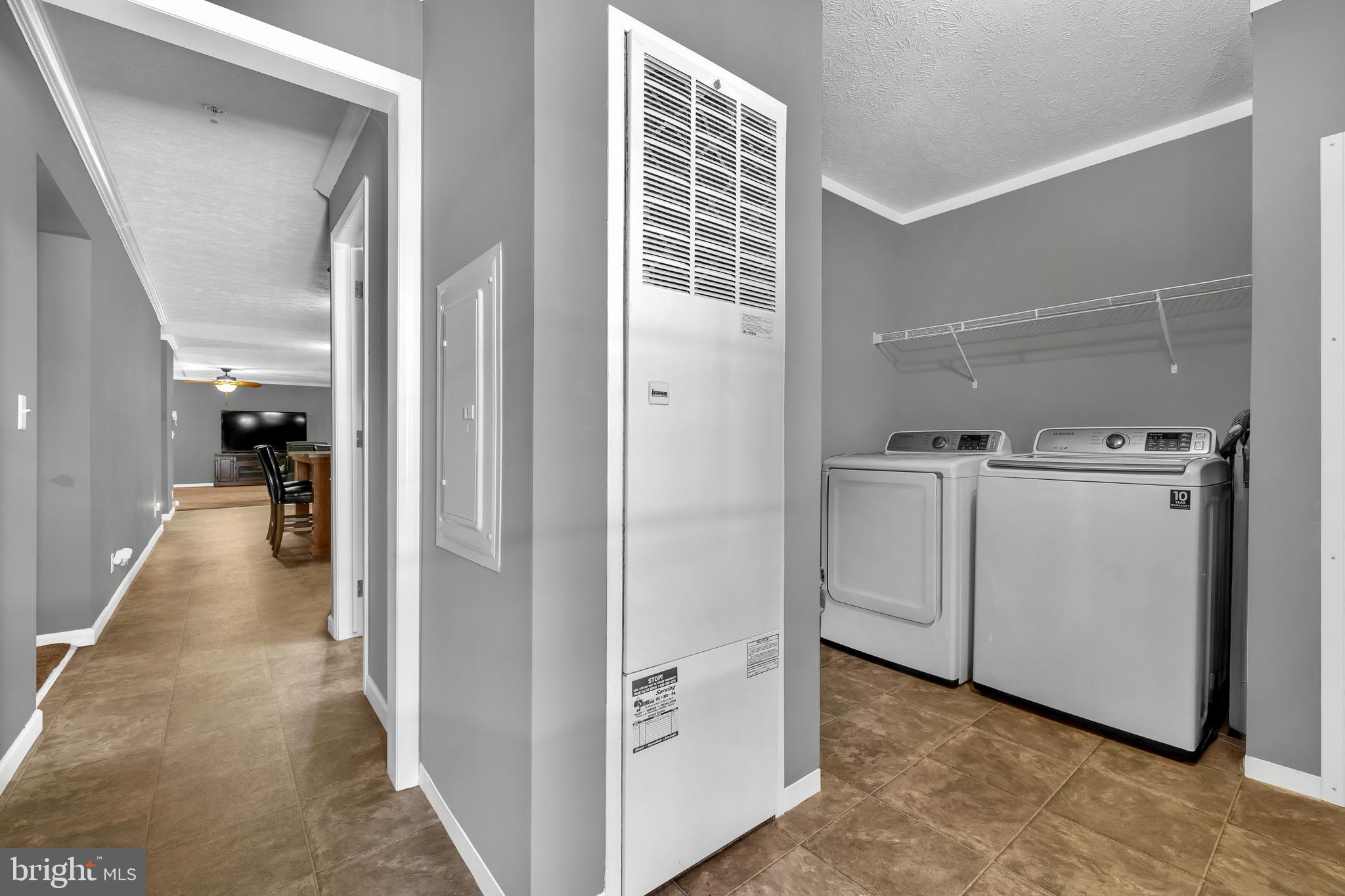 8750 Georgetown Road Chestertown, MD 21620 - Photo 12 of 25 Utility area with washer and dryer