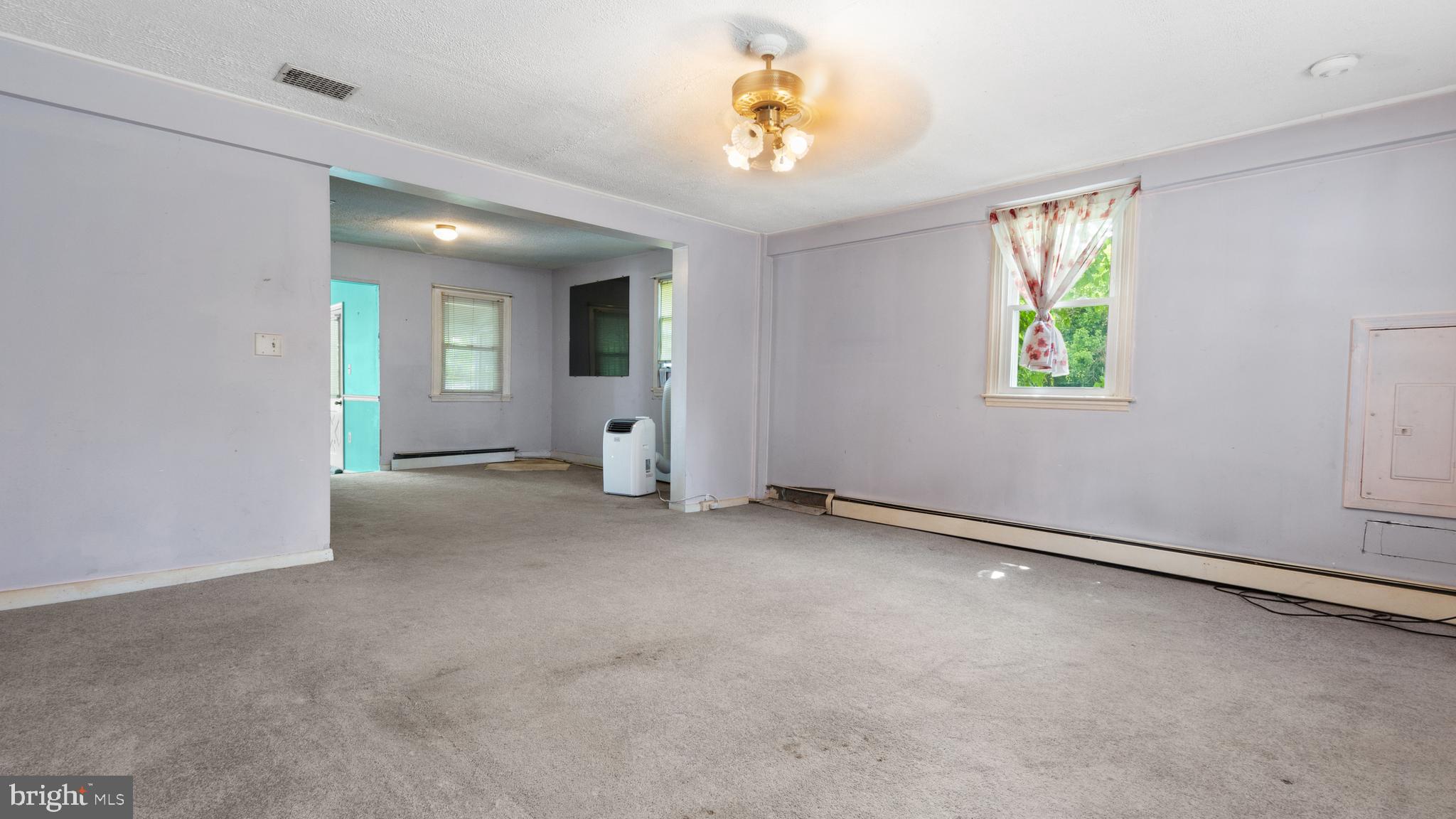 2207 Floral Park Road Clinton, MD 20735 - Photo 21 of 46 an empty room with windows and closet