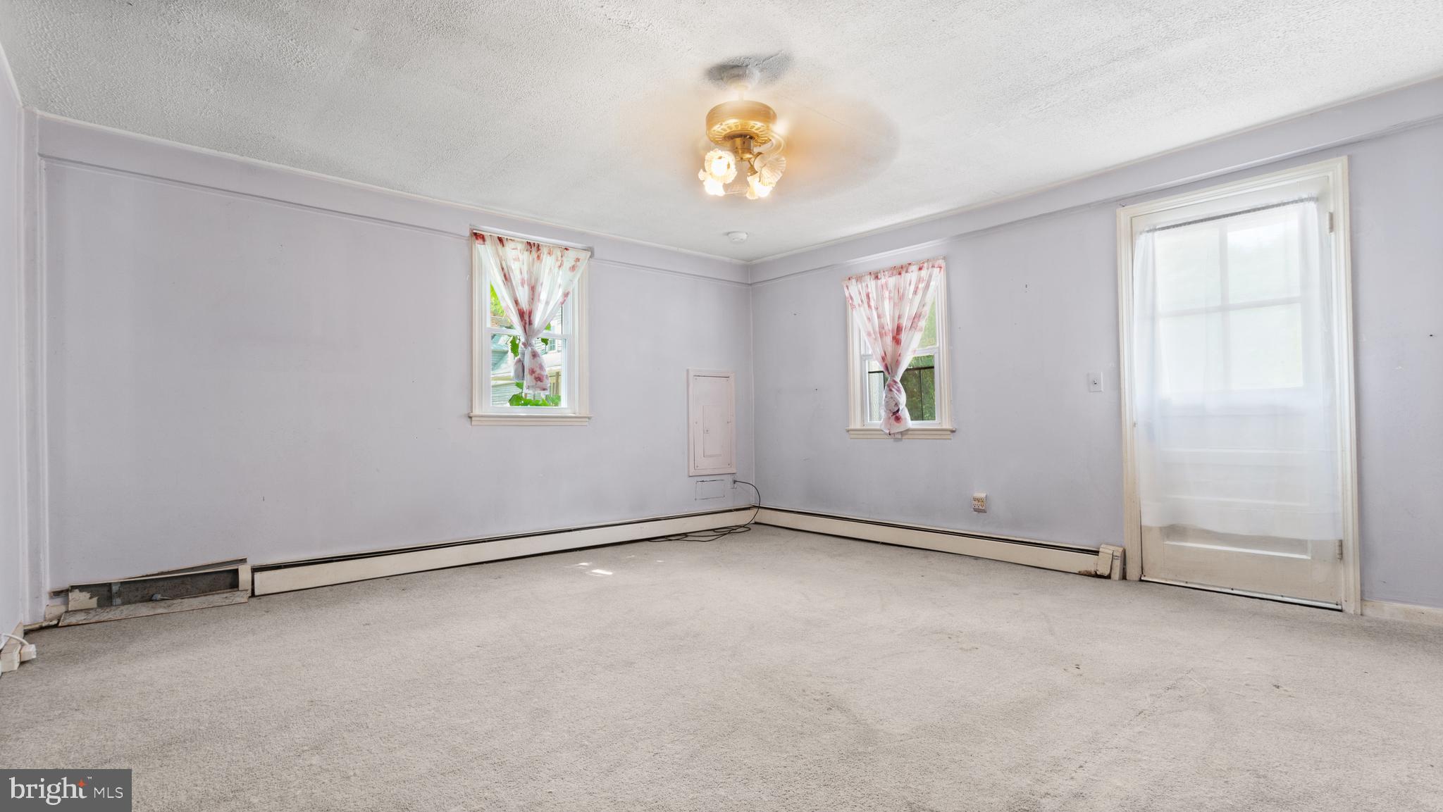 2207 Floral Park Road Clinton, MD 20735 - Photo 22 of 46 an empty room with windows and closet