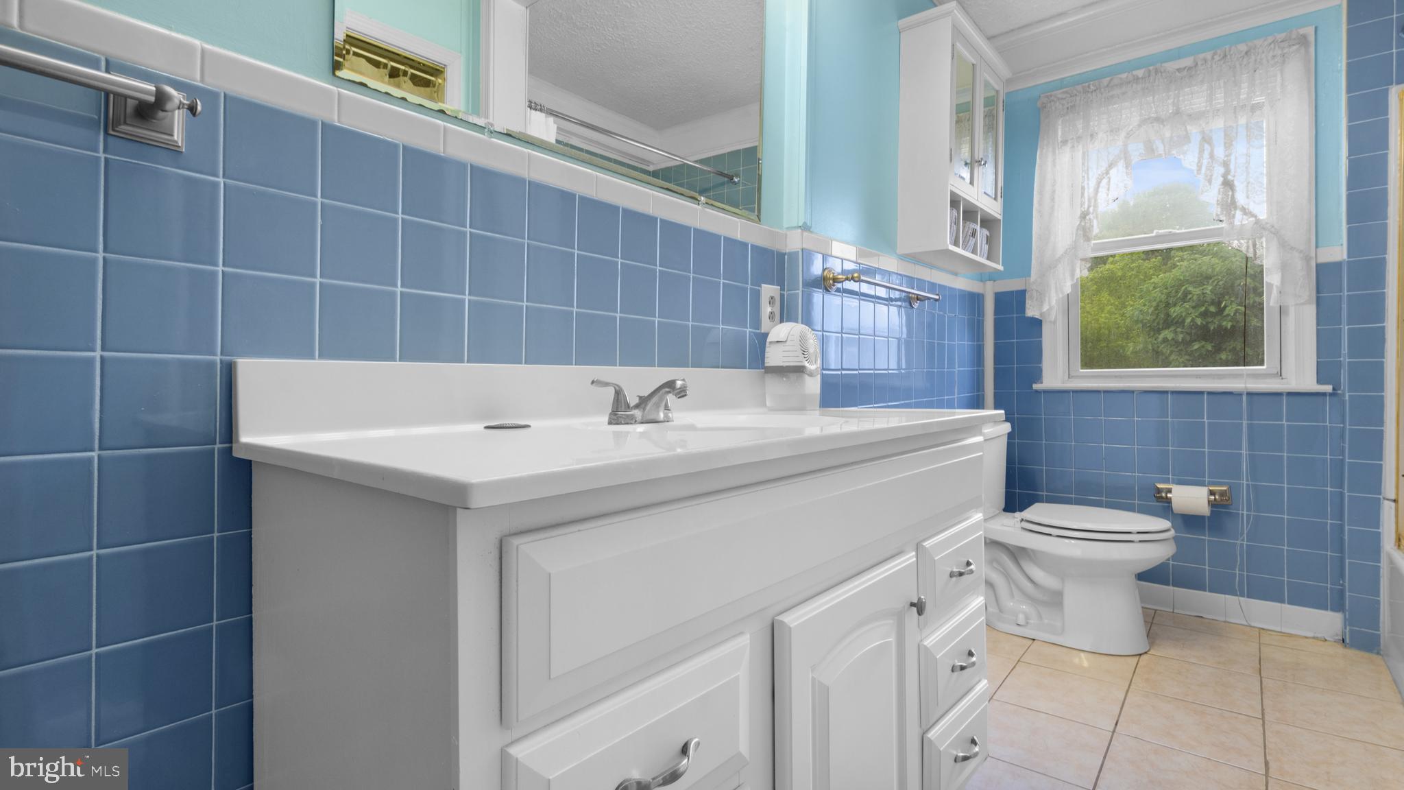 2207 Floral Park Road Clinton, MD 20735 - Photo 24 of 46 a bathroom with a sink toilet and shower
