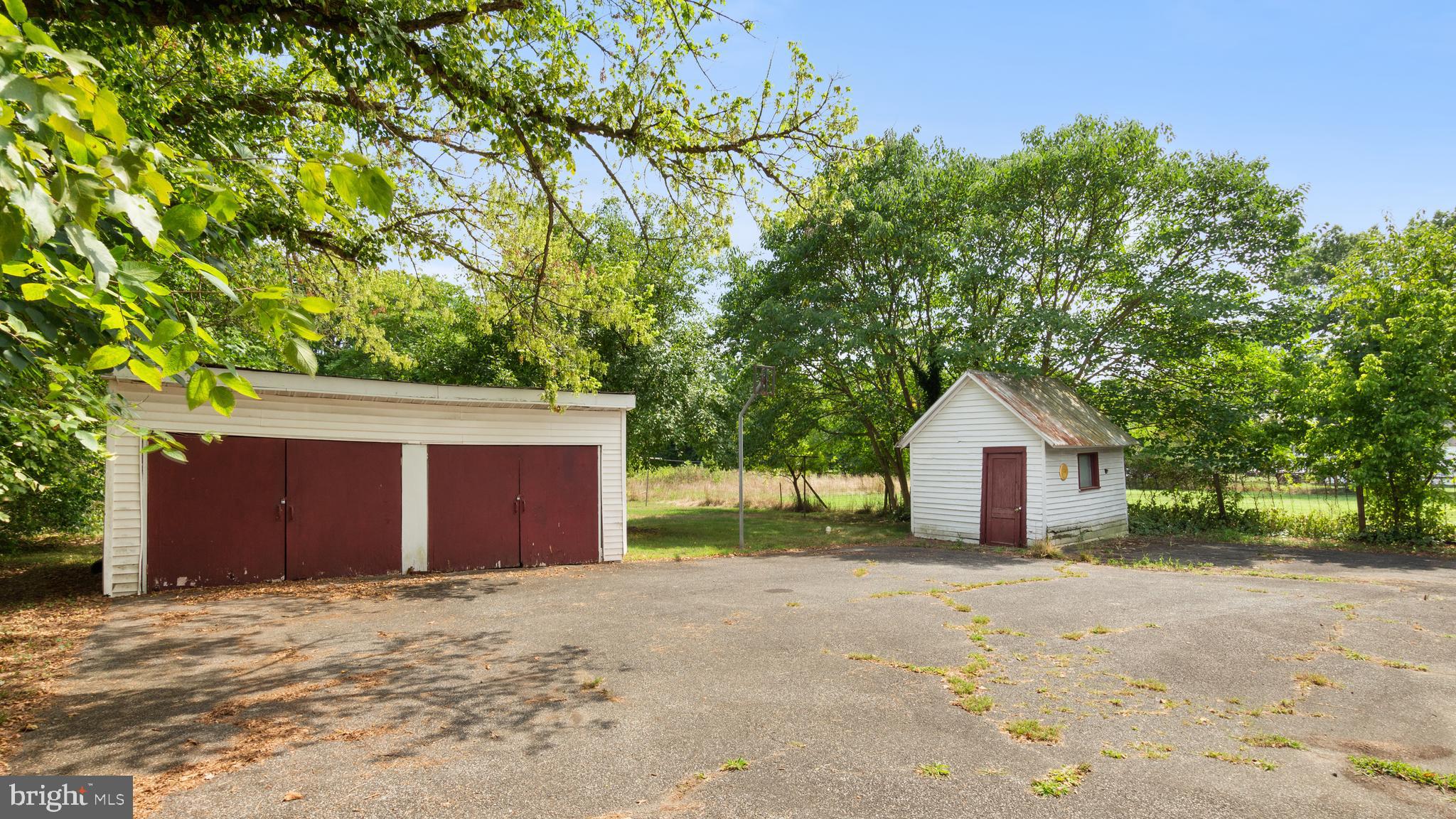 2207 Floral Park Road Clinton, MD 20735 - Photo 45 of 46 a front view of a house with a yard and garage
