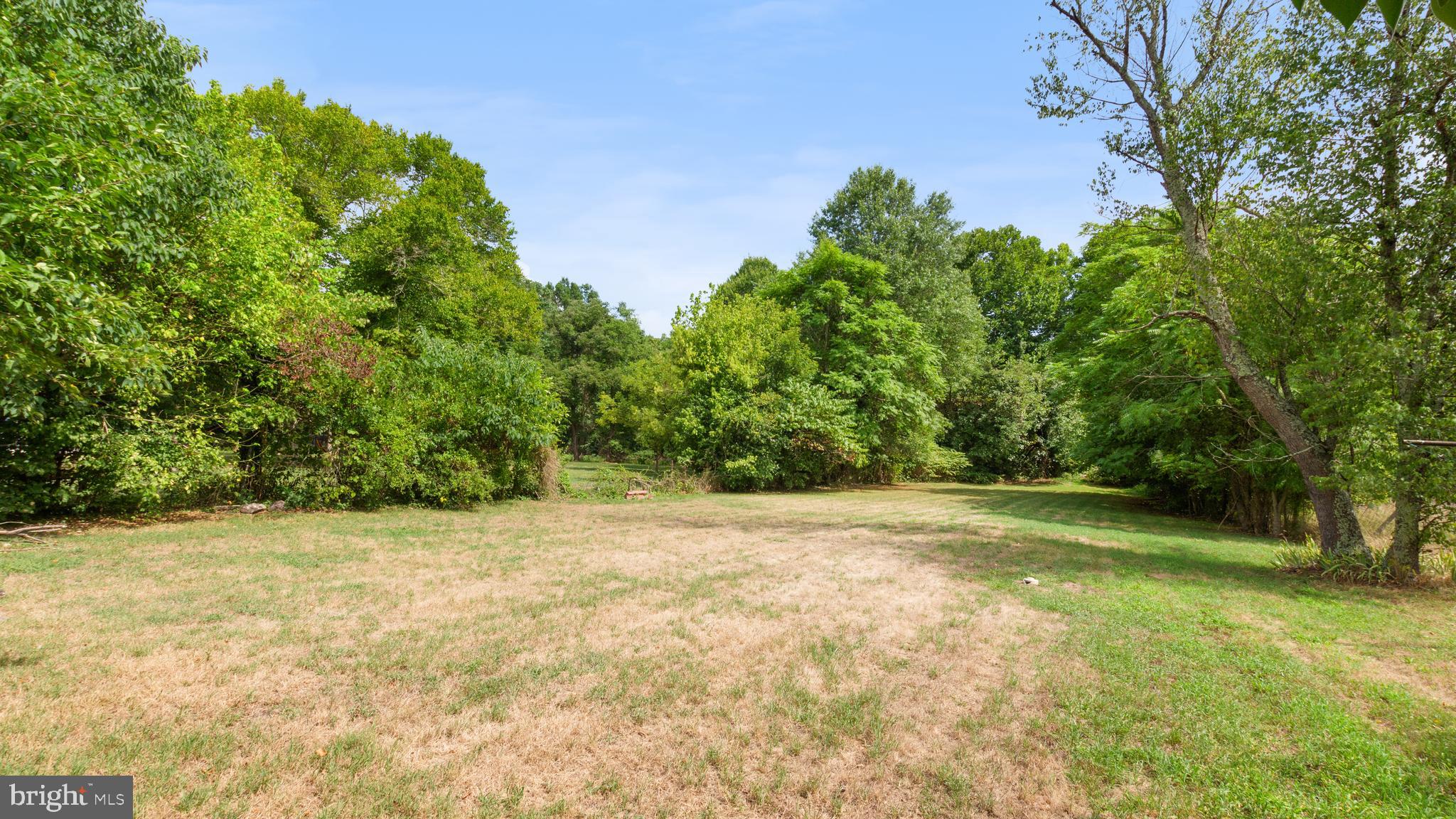 2207 Floral Park Road Clinton, MD 20735 - Photo 46 of 46 a view of a field with trees in the background