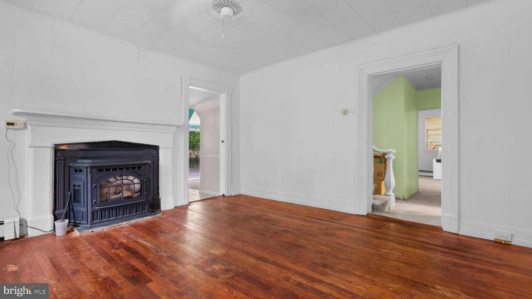 2207 Floral Park Road Clinton, MD 20735 - Photo 5 of 46 a view of an empty room and window and fire place
