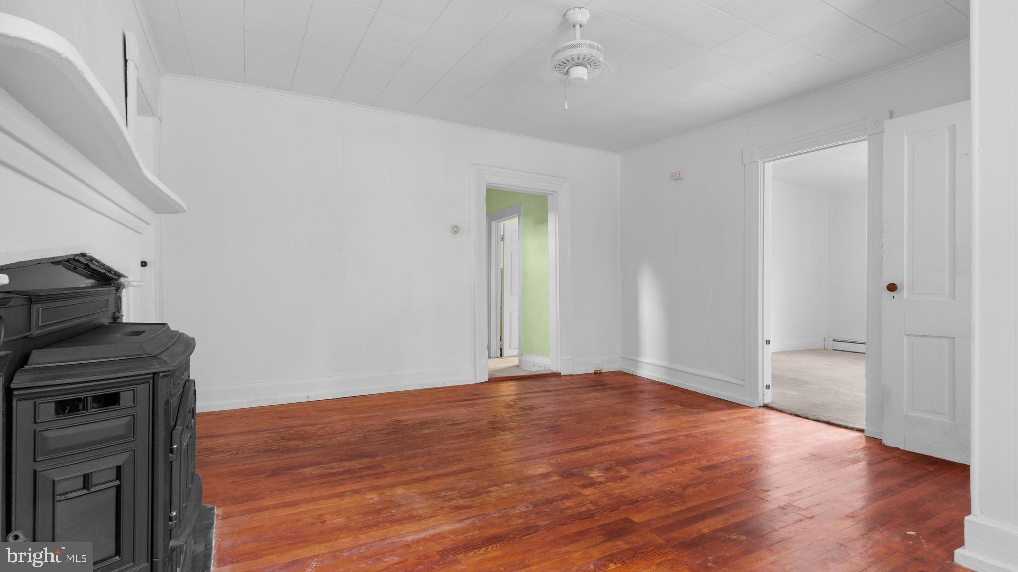 2207 Floral Park Road Clinton, MD 20735 - Photo 6 of 46 a view of an empty room with wooden floor