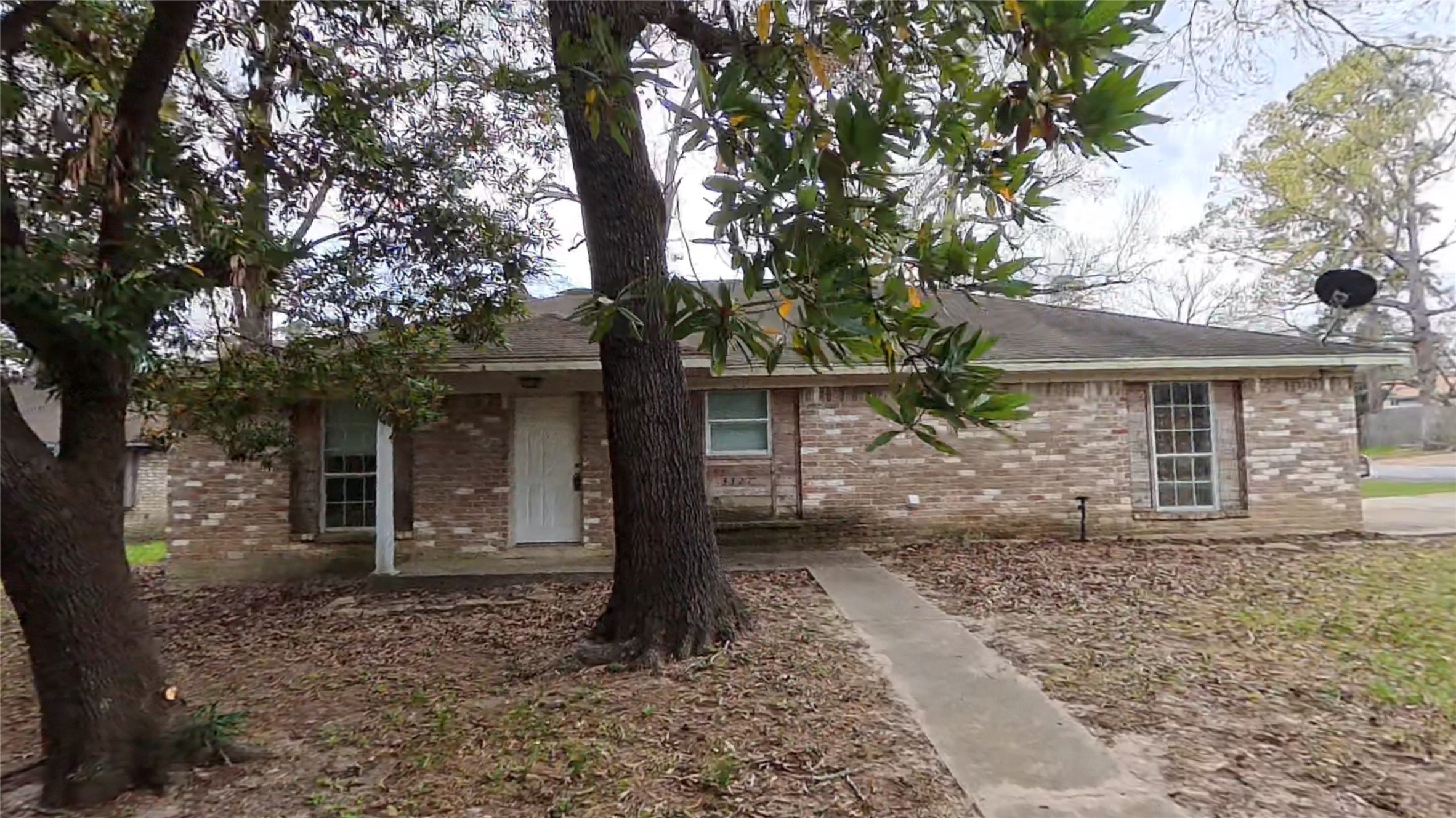 3327 Valerie Lane Spring, TX 77380 - Photo 1 of 11 a front view of a house with garden