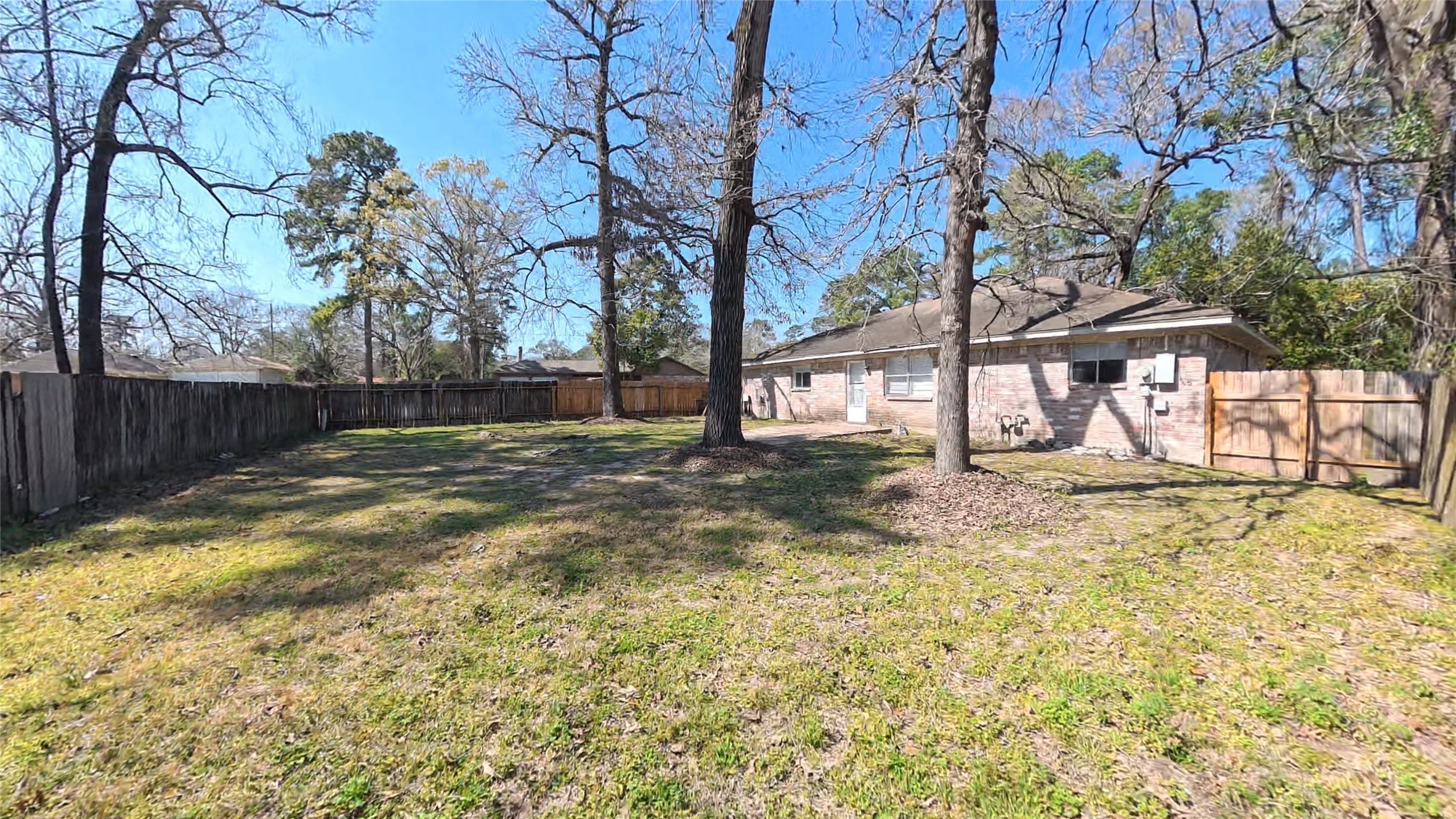 3327 Valerie Lane Spring, TX 77380 - Photo 11 of 11 a view of a yard with a tree