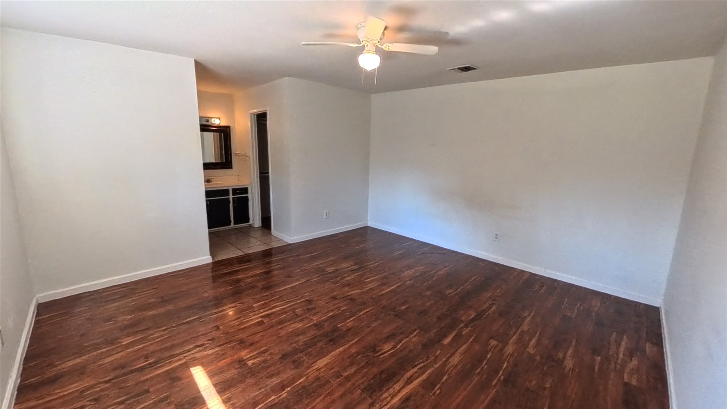 3327 Valerie Lane Spring, TX 77380 - Photo 7 of 11 a view of empty room with wooden floor