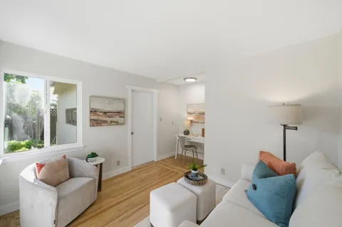 a living room with furniture and a couch