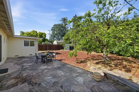 a view of a outdoor space with a patio and sitting area