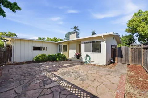 a front view of a house with a patio