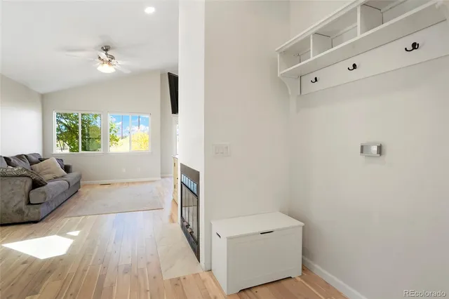 a bedroom with a bed and flat screen tv