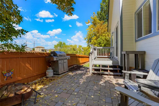 a backyard of a house with seating space