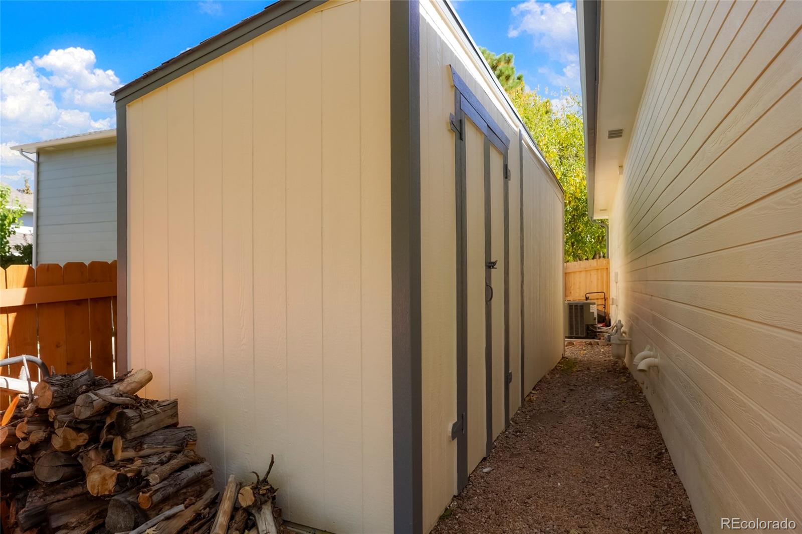 535 Howe Street Castle Rock, CO 80104 - Photo 25 of 25 a view of a house with a backyard