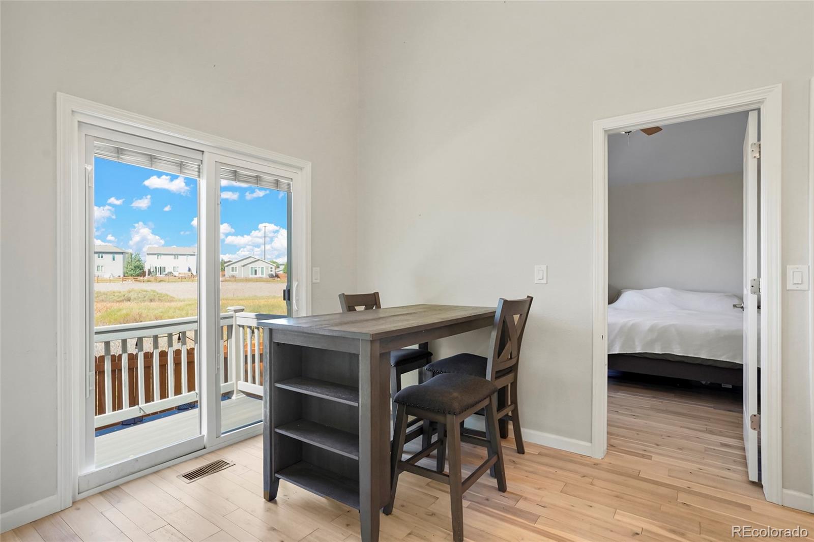 535 Howe Street Castle Rock, CO 80104 - Photo 6 of 25 a view of a workspace with furniture and a window