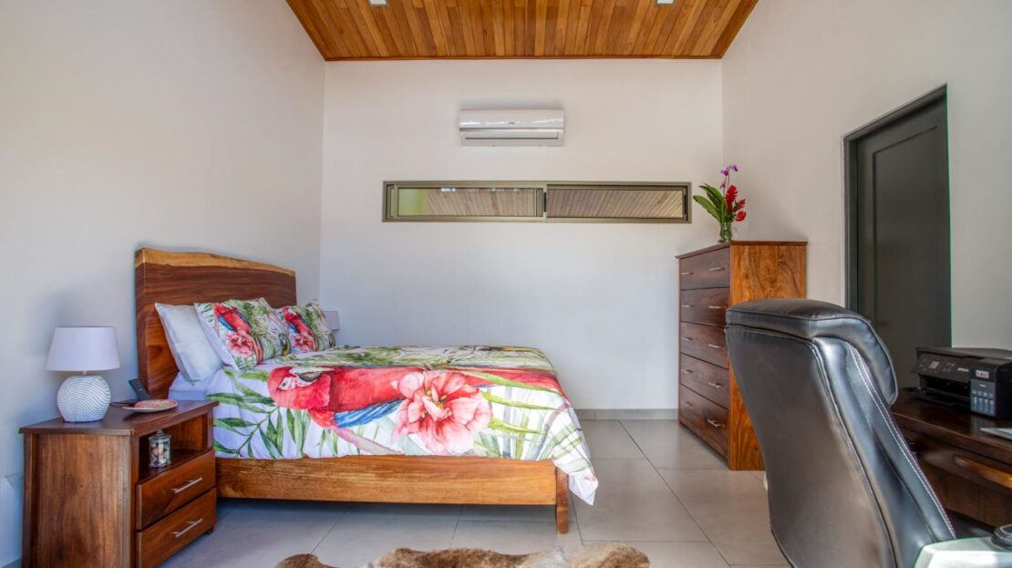0 Modern Gem In The Natural Setting Washington, OS 20006 - Photo 11 of 33 Bedroom featuring wooden ceiling, an AC wall unit, an office area, recessed lighting, and light tile patterned floors