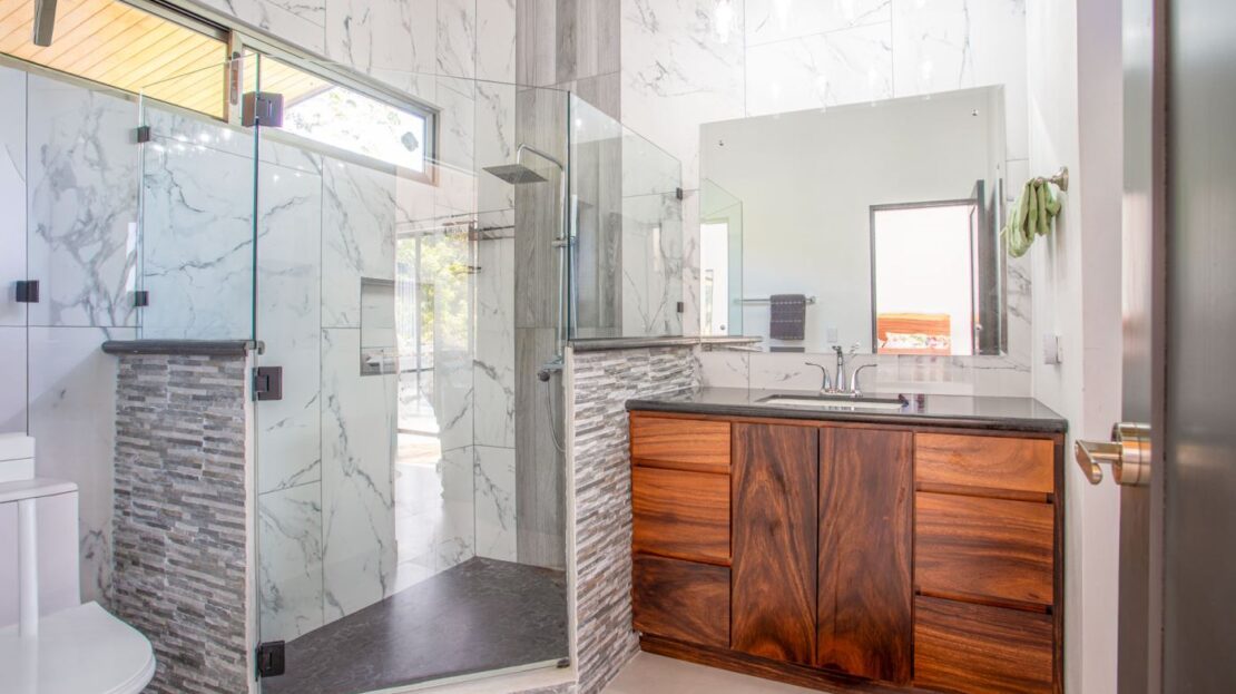0 Modern Gem In The Natural Setting Washington, OS 20006 - Photo 12 of 33 Full bathroom with vanity and a marble finish shower