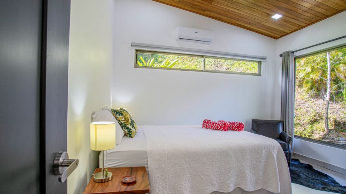 0 Modern Gem In The Natural Setting Washington, OS 20006 - Photo 14 of 33 Bedroom featuring wooden ceiling, an AC wall unit, and lofted ceiling