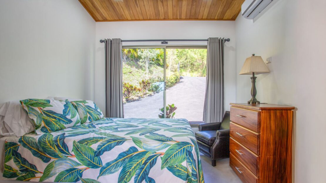 0 Modern Gem In The Natural Setting Washington, OS 20006 - Photo 15 of 33 Bedroom with wood ceiling and a wall mounted air conditioner