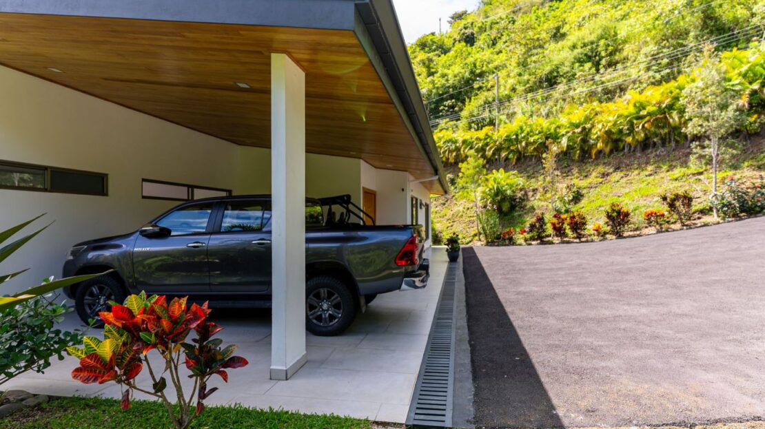 0 Modern Gem In The Natural Setting Washington, OS 20006 - Photo 22 of 33 View of car parking featuring an attached carport