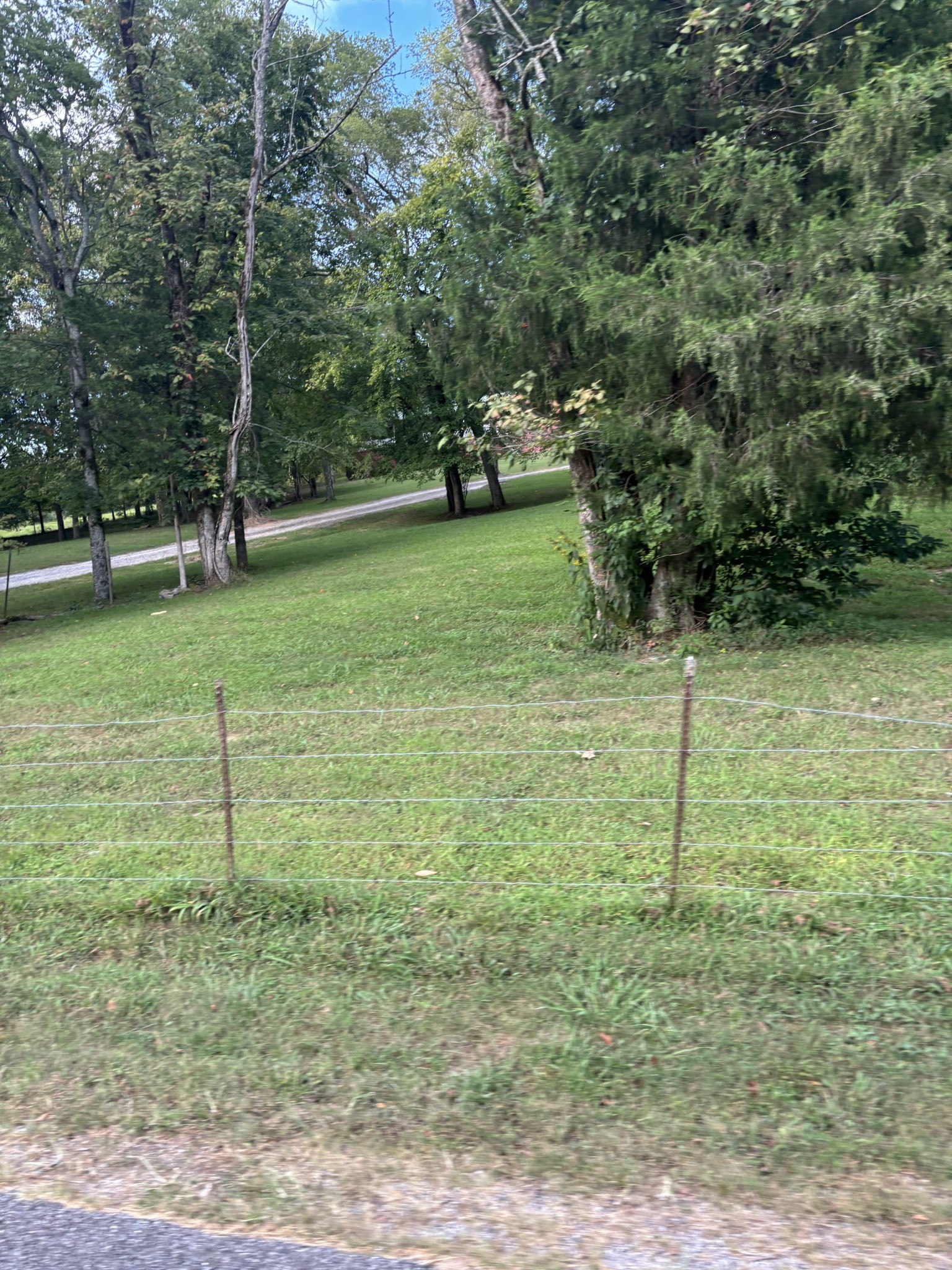 0 Ballenger Road Carthage, TN 37030 - Photo 18 of 19 a backyard of a house with lots of green space