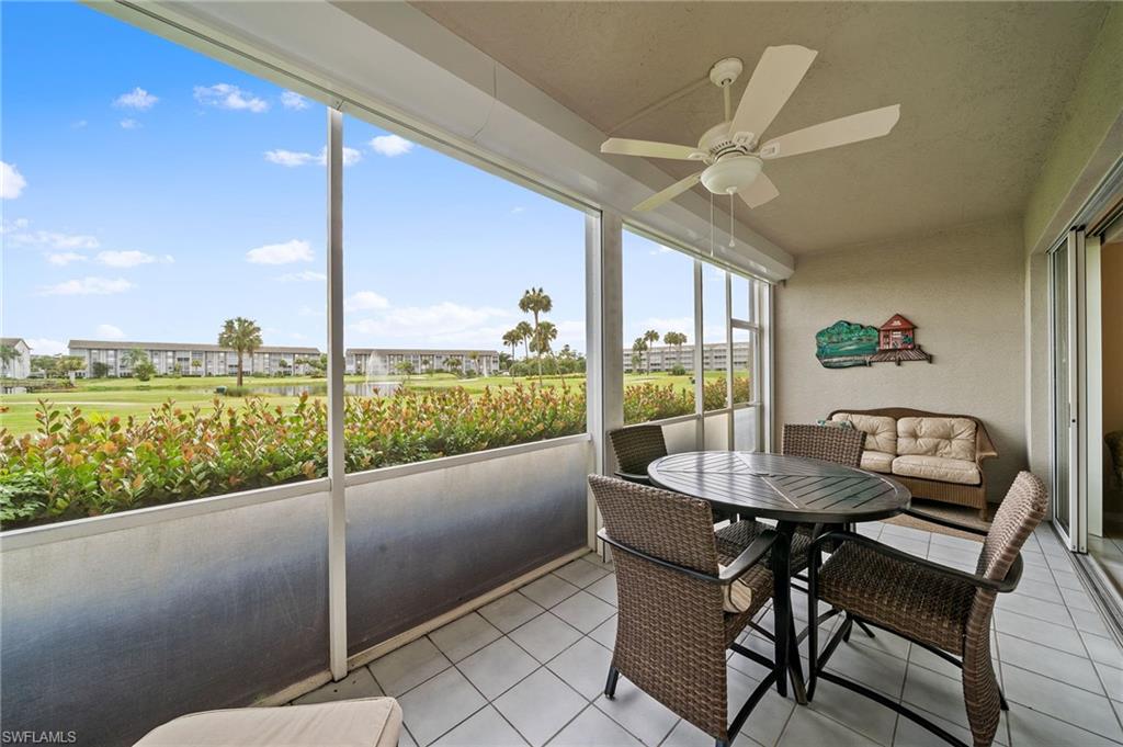 14771 Hole In 1 Circle, Unit 108 Fort Myers, FL 33919 - Photo 18 of 22 a view of a dining room with furniture window and outside view