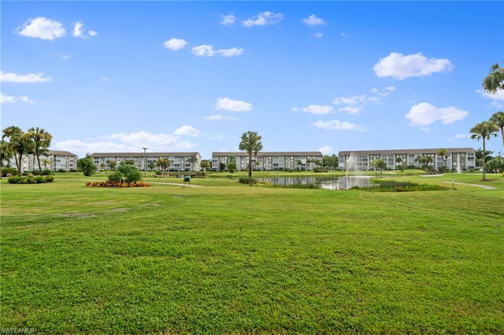 14771 Hole In 1 Circle, Unit 108 Fort Myers, FL 33919 - Photo 19 of 22 a view of a large trees with a big yard