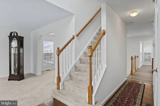 a bathroom with a sink a mirror and shower