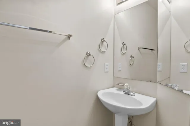 a view of a hallway with entryway door