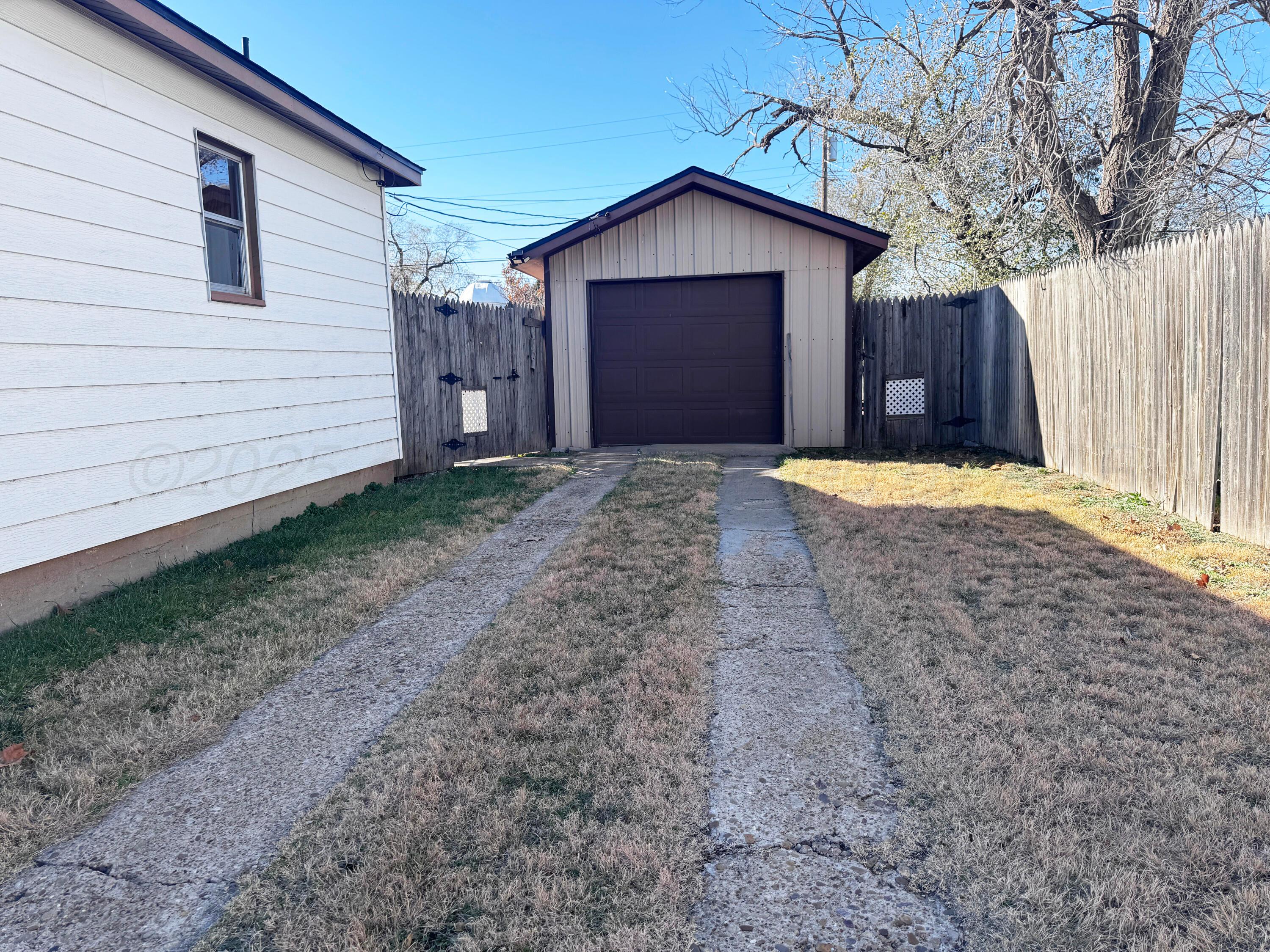 4004 South Hayden Street Amarillo, TX 79110 - Photo 12 of 14 a view of a backyard of the house