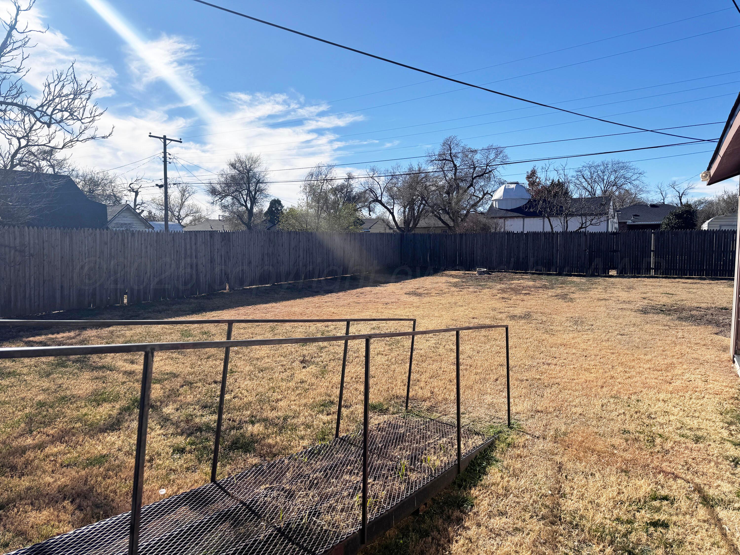 4004 South Hayden Street Amarillo, TX 79110 - Photo 13 of 14 a view of wooden fence