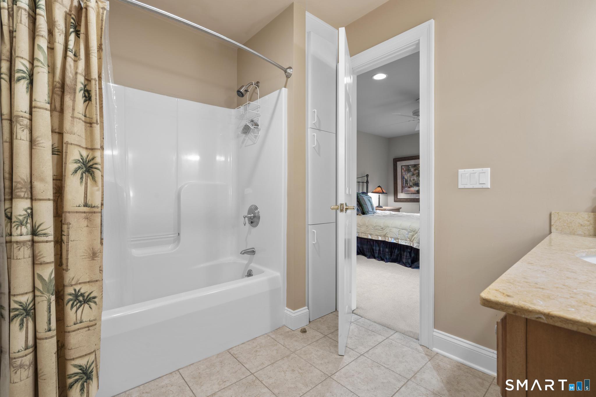 12 Logans Way Danbury, CT 06811 - Photo 27 of 40 a bathroom with a tub shower and sink