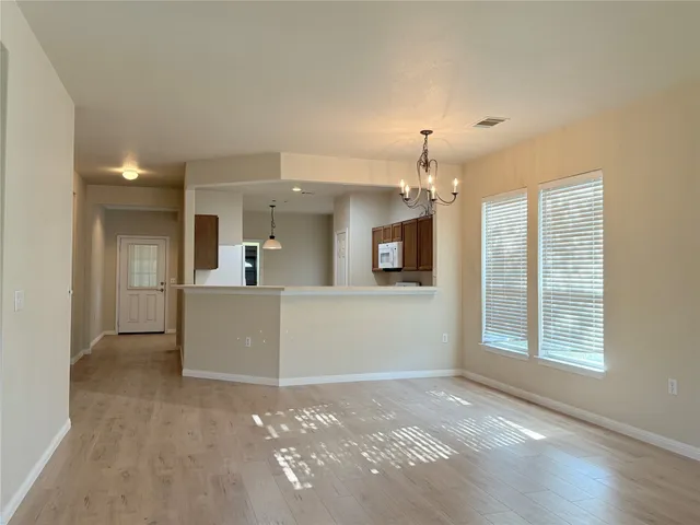 a view of a kitchen and a window