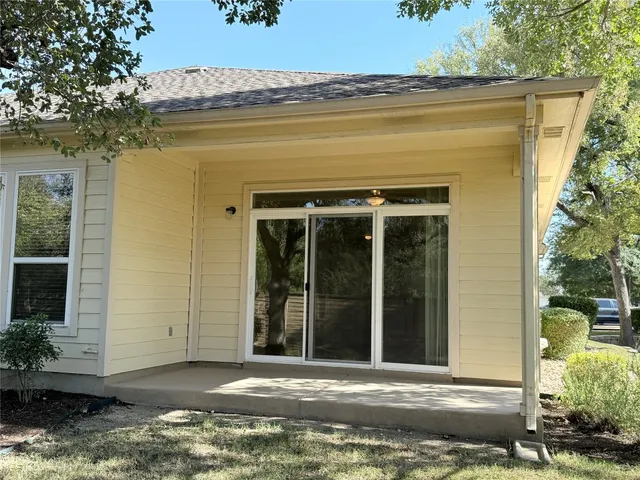 a view of a house with a ocean view