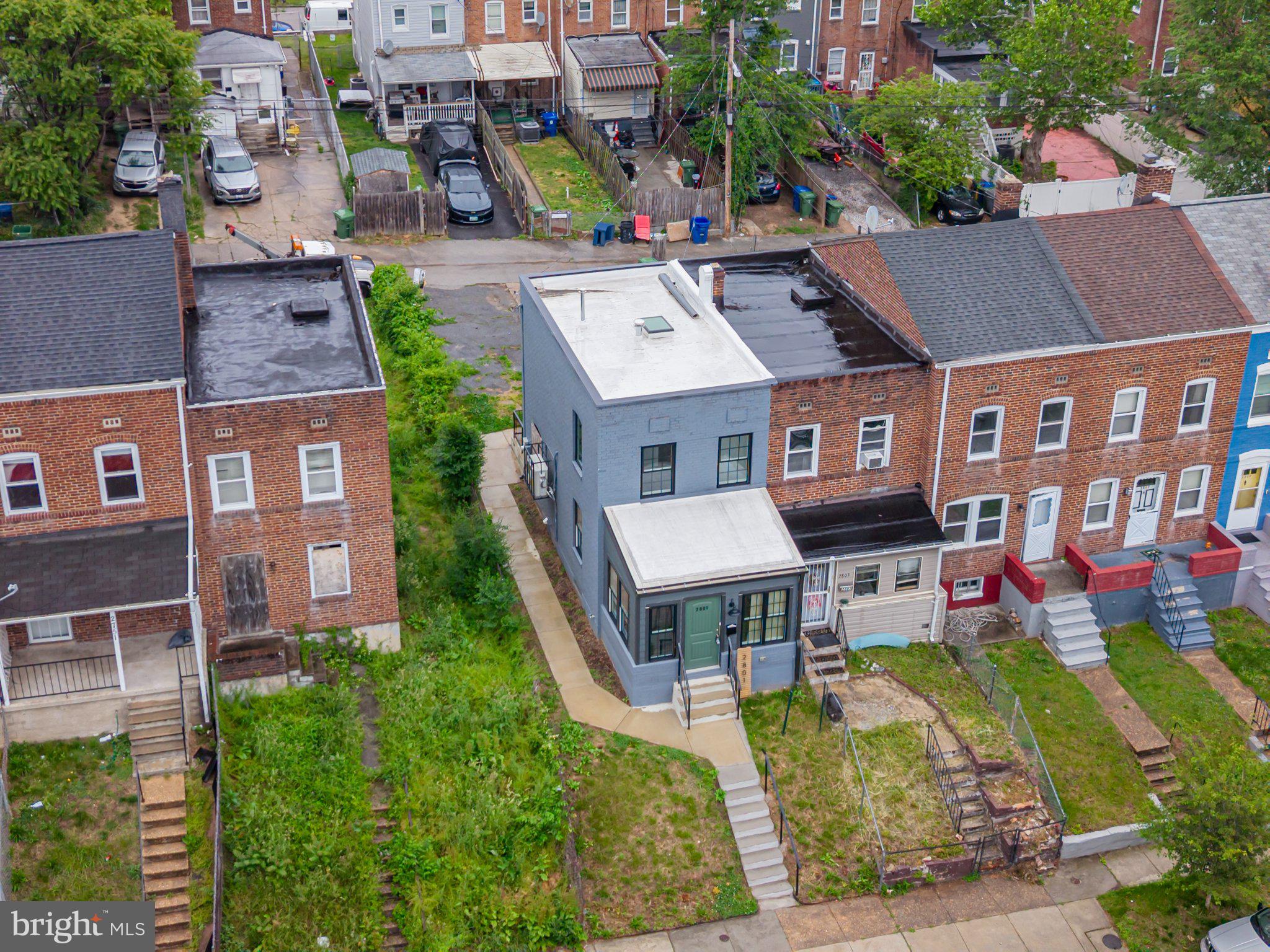 2801 Round Road Baltimore, MD 21225 - Photo 2 of 29 an aerial view of a house with a yard