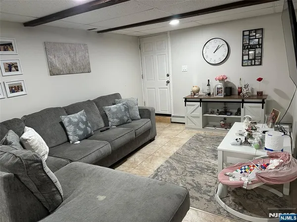 a living room with furniture and couch