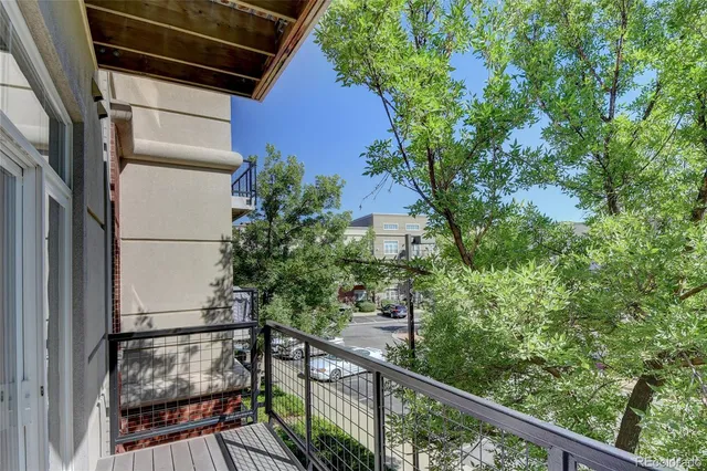 a view of balcony with a tree