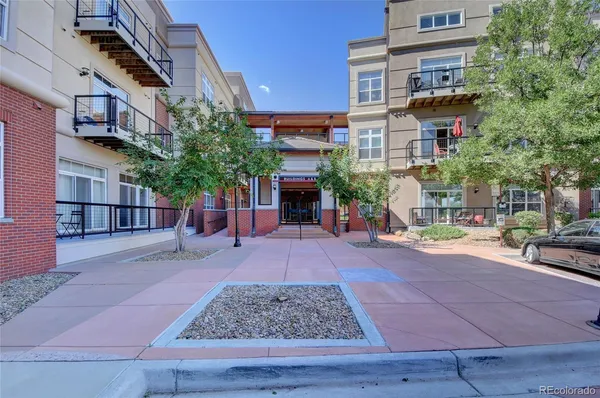 a building with trees in front of it