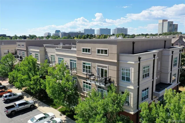 a view of city with tall buildings