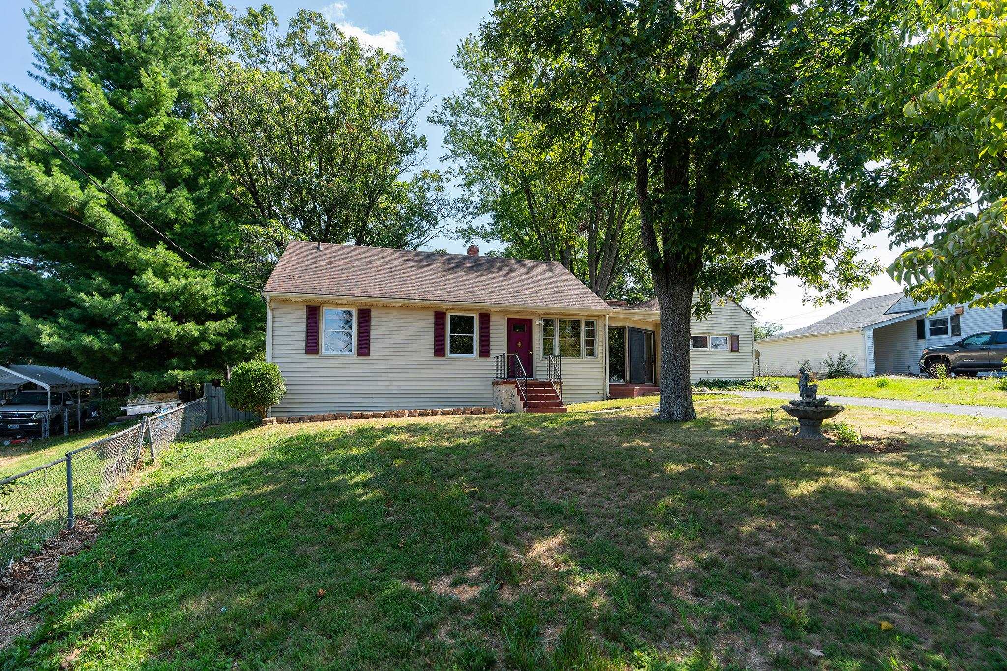 205 Devon Road Staunton, VA 24401 - Photo 2 of 71 a front view of a house with a yard