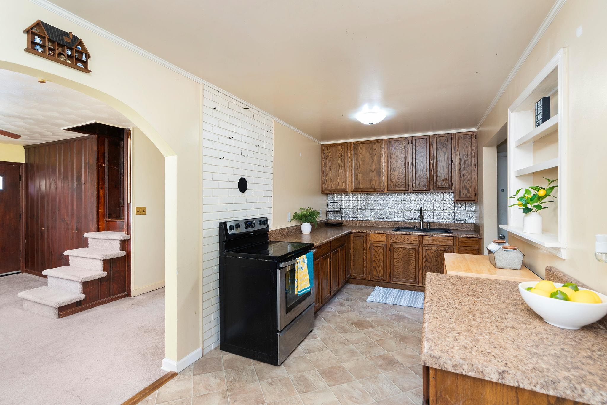 205 Devon Road Staunton, VA 24401 - Photo 25 of 71 a large kitchen with stainless steel appliances kitchen island granite countertop a refrigerator and a sink