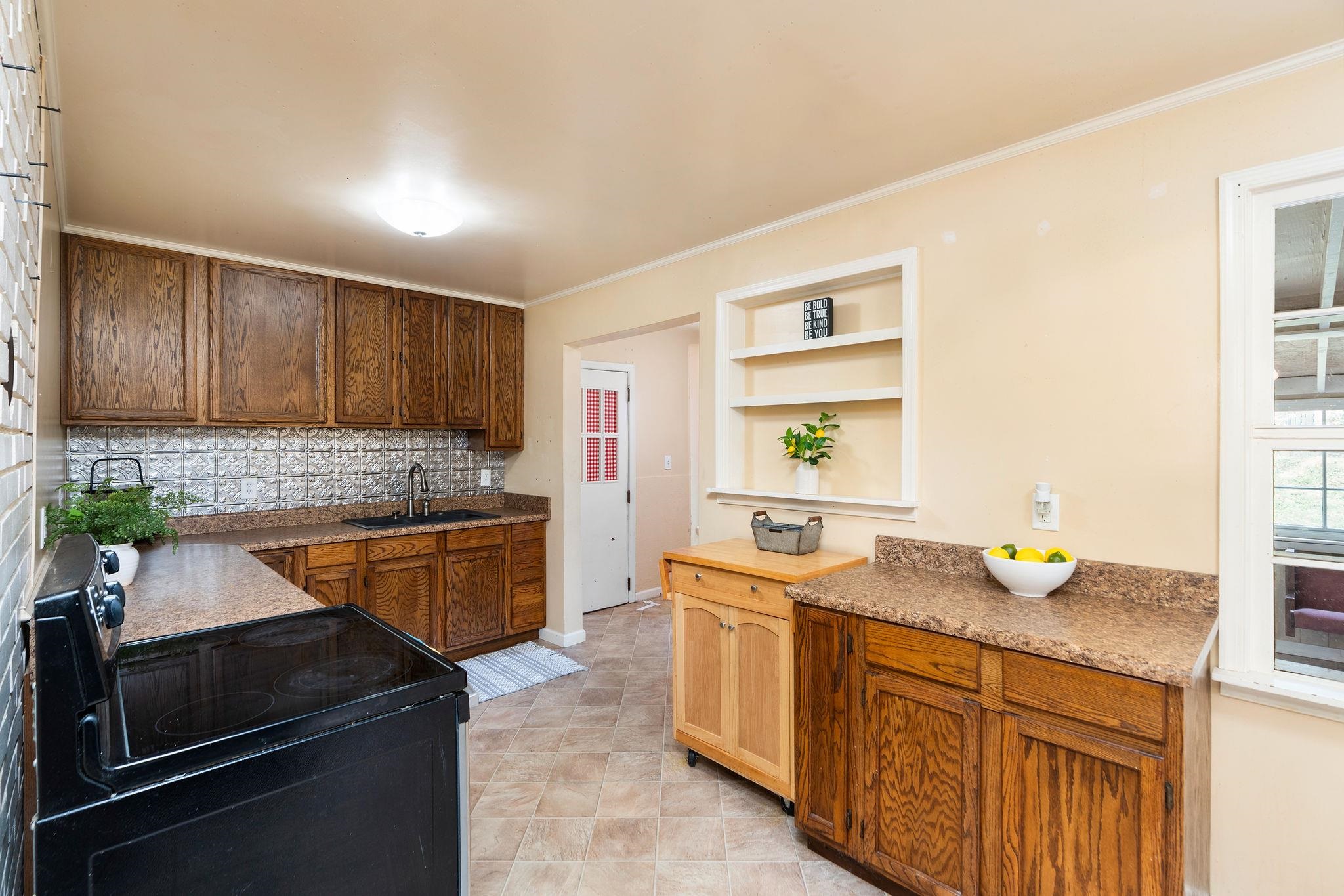 205 Devon Road Staunton, VA 24401 - Photo 27 of 71 a kitchen with a sink stove and cabinets