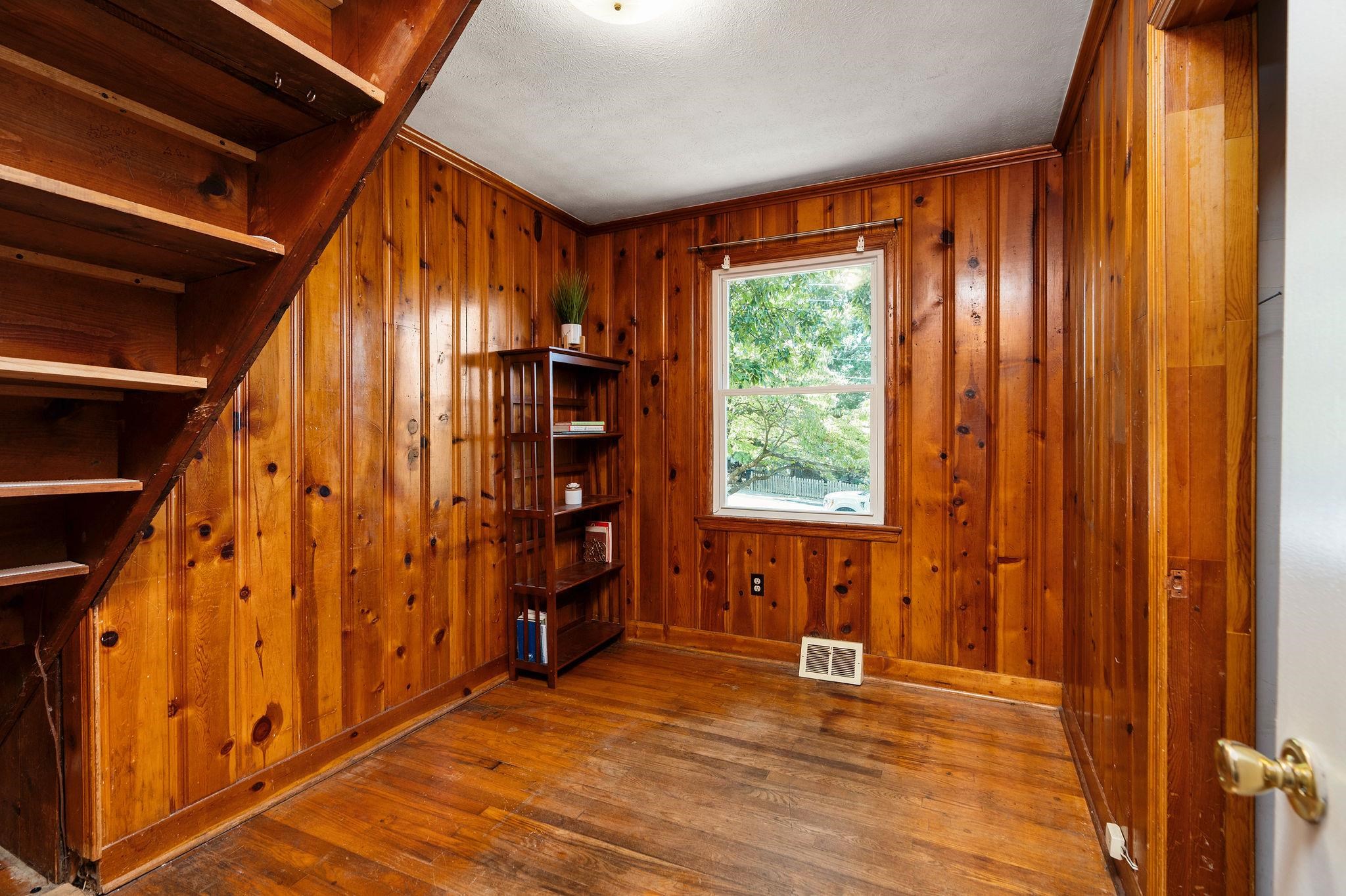 205 Devon Road Staunton, VA 24401 - Photo 37 of 71 a view of an empty room with a window and wooden floor