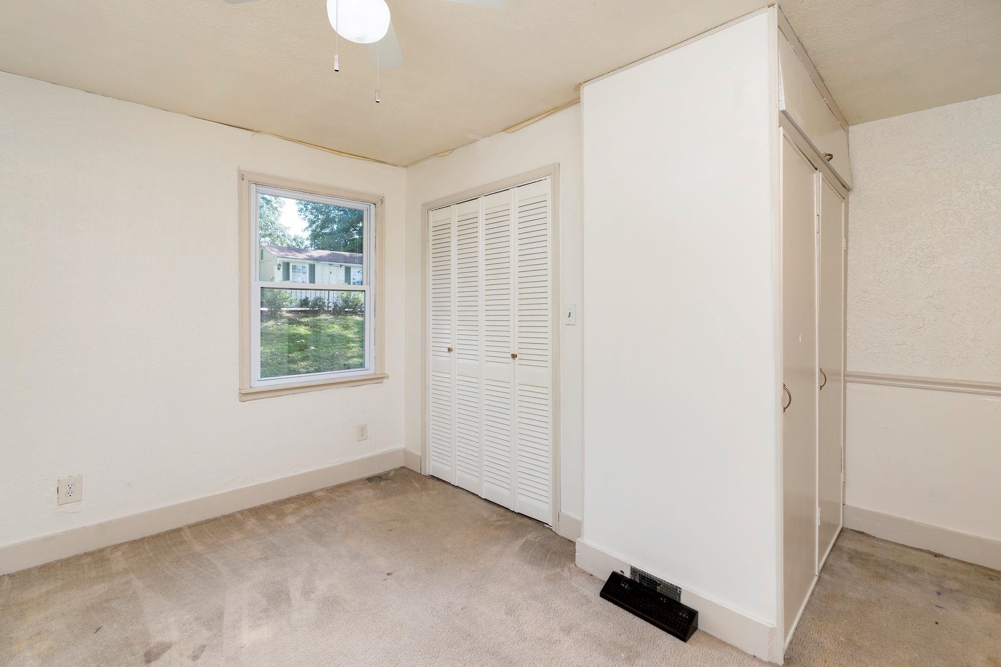 205 Devon Road Staunton, VA 24401 - Photo 45 of 71 a view of an empty room with a window