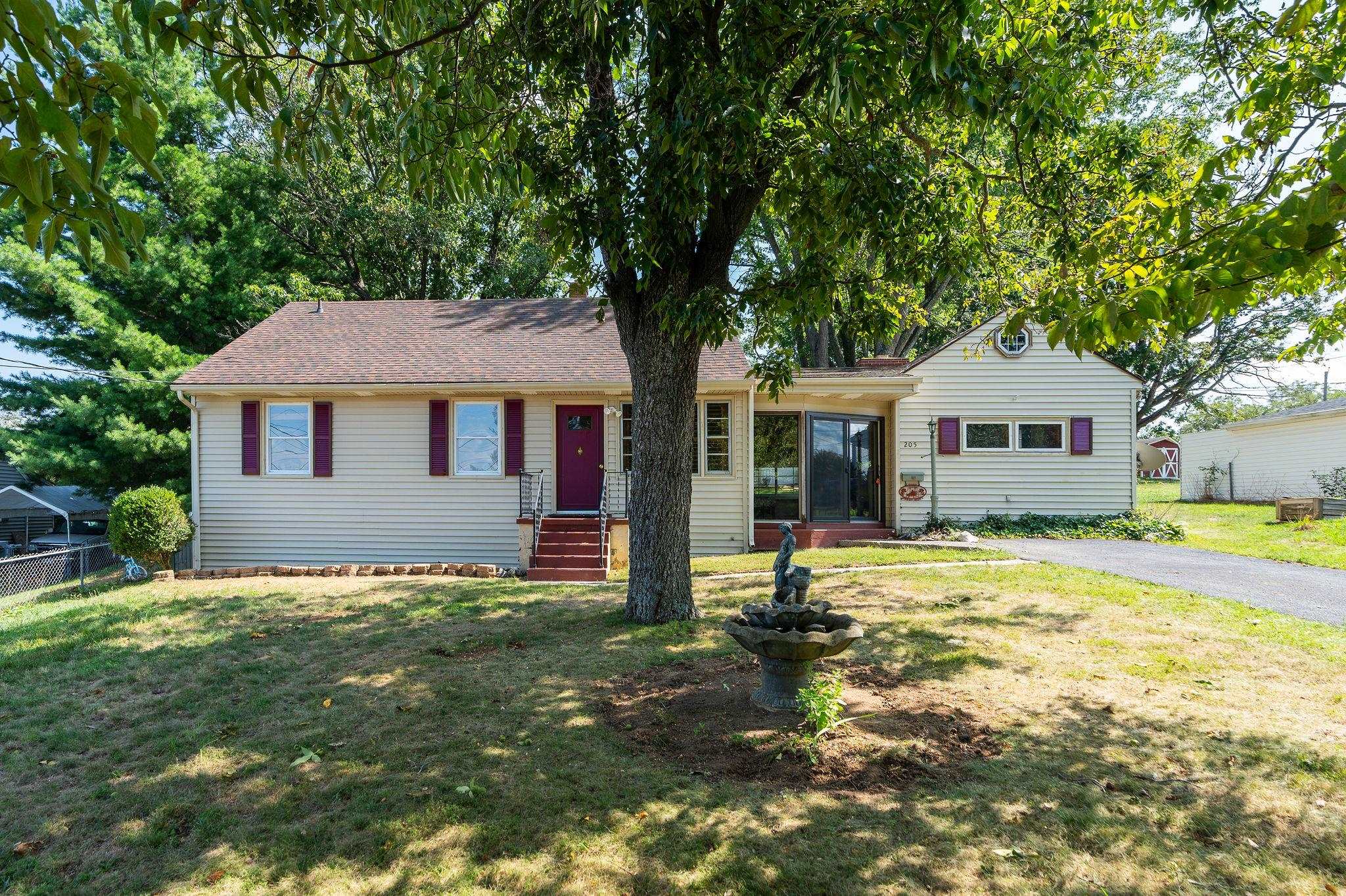 205 Devon Road Staunton, VA 24401 - Photo 5 of 71 a front view of a house with a yard
