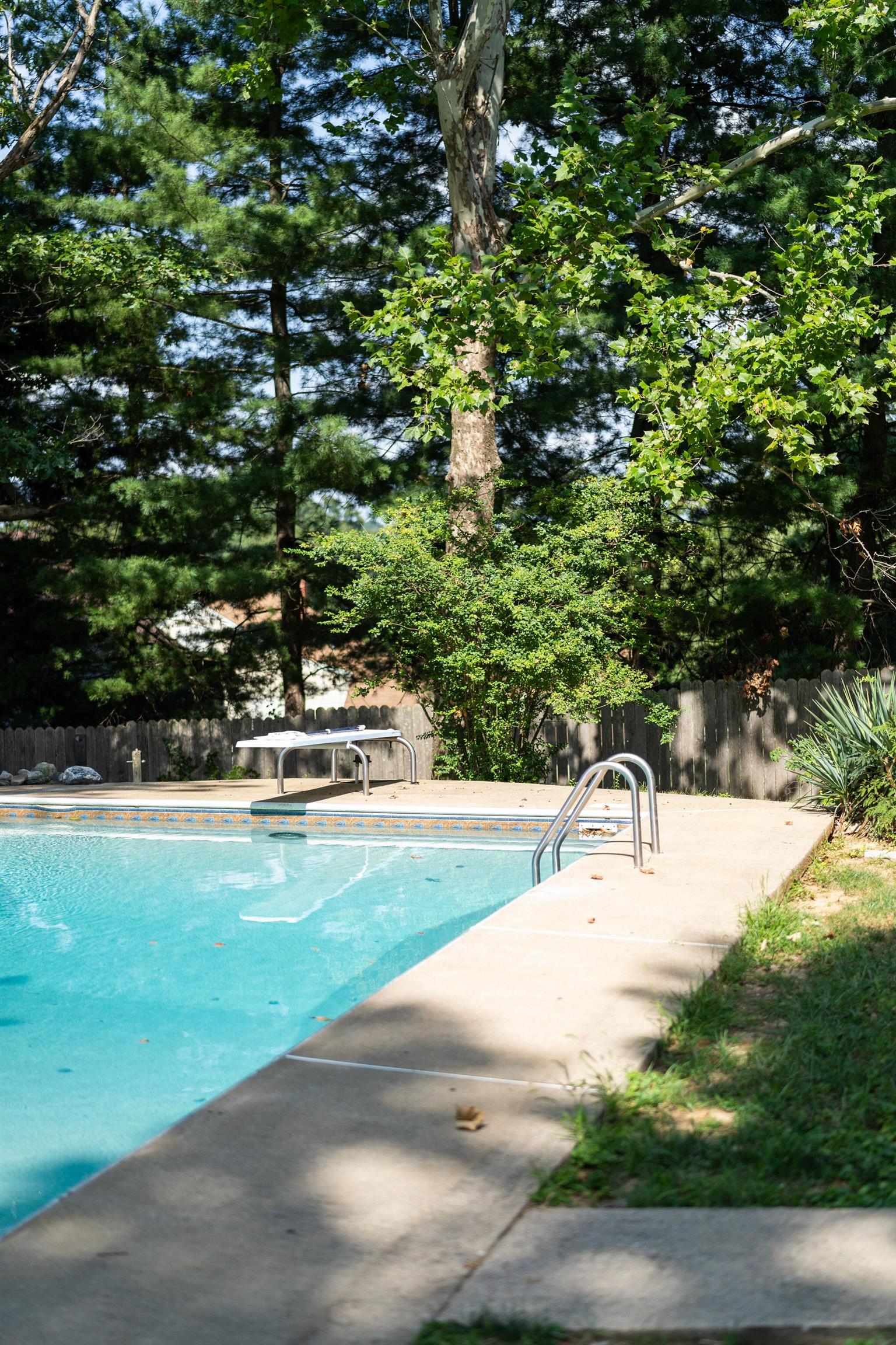 205 Devon Road Staunton, VA 24401 - Photo 64 of 71 a swimming pool with outdoor seating and yard